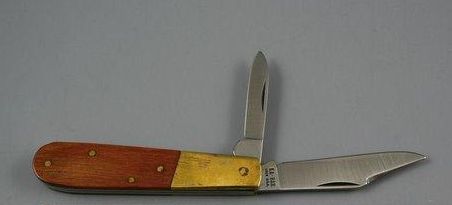KaBar Barlow, wood and brass.jpg