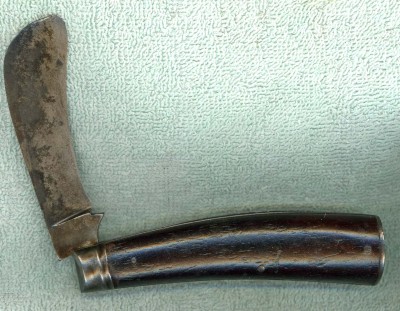 Walden Knife Co Hawkbill pile.jpg