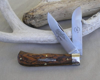 Tidioute Cutlery #73 Pioneer 
<br />78 pieces Great looking wood. I have a 2007 that I carry, feels good to carry one with a wood handle! It does get a lot of compliments.
