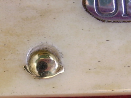un-X-ld pin.jpg