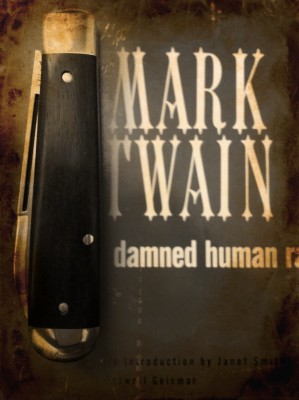 Couldnt find my copy of Huck Finn so i chose "On The Damned Human Race"