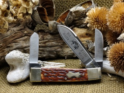 Bulldog gunstock with items found on the prairie