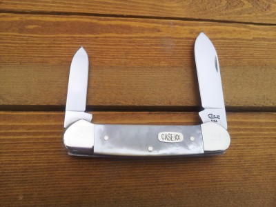 1996 82131 Pearl Canoe_mark blades open.jpg