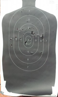 GOVERNER_target_ 3 000 Buckshot_ 3 Defender rounds at 21 feet.jpg