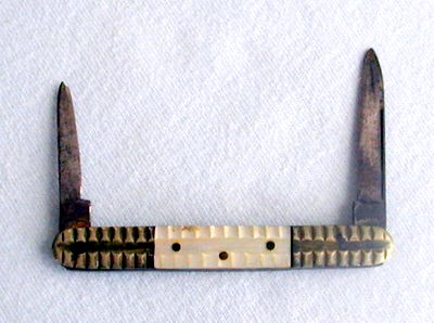 Just over 2 in long great old knife,German c1920s ??
