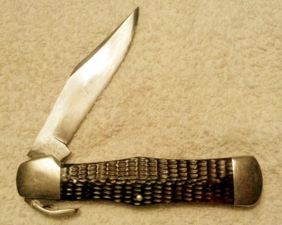 KA-BAR thumb release folder back side.jpg