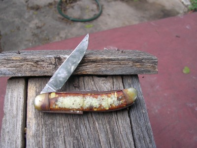 Same knife. The blade looks pretty god but the rest of the knife is toast.