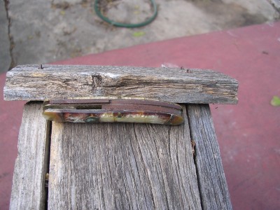 Backside view of a Bulldog knife. Notice the broken backspring