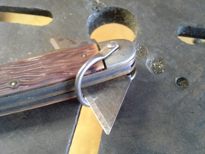 After the first pin cut. Used the clearance hole in my drill press table to clear the knife as I was hammering on it. This worked great by the way.