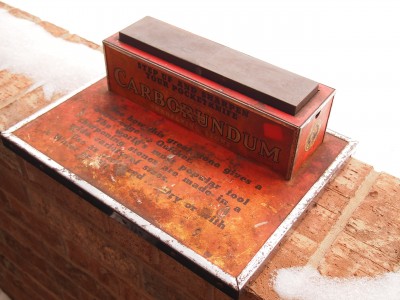 the Carborundum indian is on each side