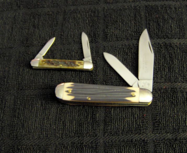 A small Queen Pen and a Queen Jack.