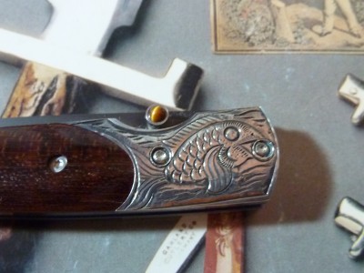 One of a kind William Henry with Snakewood handle and Sterling Silver Bolster with carved Koi Fish