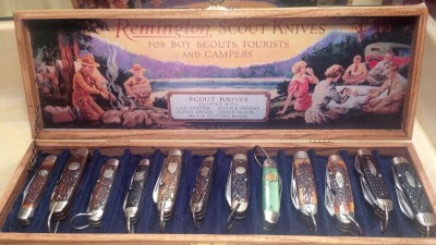 Dozen scout/camp knives in reproduction Remington display box.