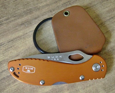 Buck 721 Slimline Orange (Walmart) - Closed Mark.JPG