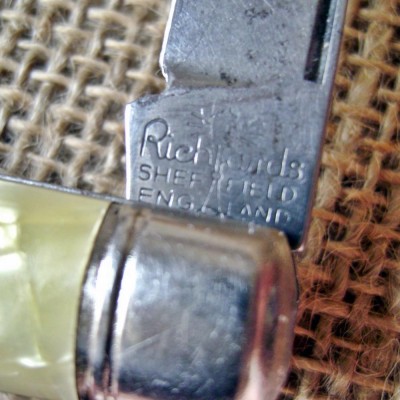 Richards - Sheffield England (Bomb from Lawrence) - Tang Stamp.JPG