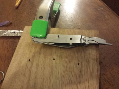 This is where I left off a few nights ago after a few frustrating evenings of trying to hold the tools in place while I tried to bend the backspring into position.  I said screw it, got one side into position and clamped it down so I could measure its thickness so I can plan ahead.