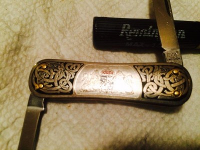 1 ELK Sweden Celtic Serpent (silver inlay).jpg