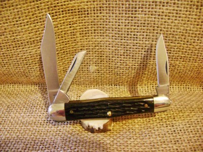 Camillus 72 - '89 to Close Black Bone Handles (1990s) - Open Pile.JPG