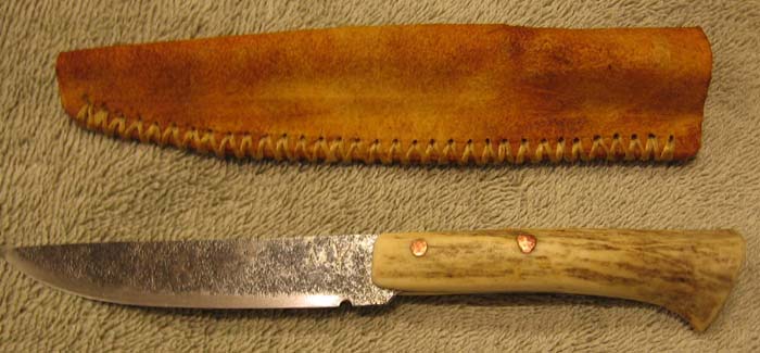 Small patch knife.  Saw blade steel, whitetail antler handle.  $40.