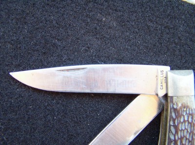 The "American Wildlife" print is just barely a shadow on the blade, but if you hold your mouth right, (a fave saying of my dad's), you can still read it.
