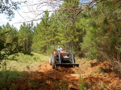 Trying to add depth in the almost rock hard clay.  It was difficult to even get the subsoiler to penetrate the hard clay