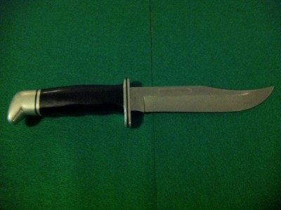 A nice early Buck 119 fixed blade with sheath.