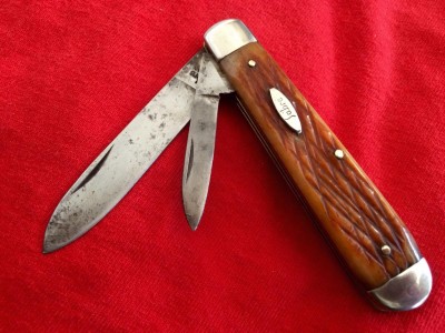 Early Sabre with with carbon steel blades, nickel silver bolsters, brass pins/liners and bone handles.