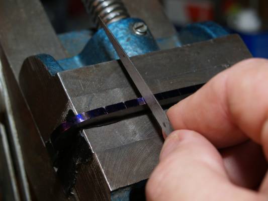 Start a small groove at each mark using a half round file, very important to be accurate and start file almost flat on working surface.