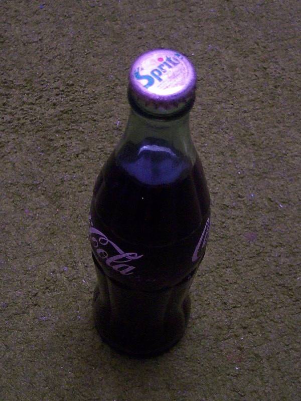 Coke bottle with wrong cap.