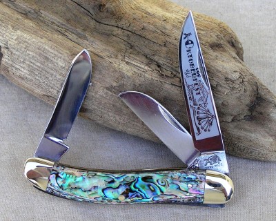 1 of 3 Prototype Genuine Heart Abalone engraved on the back. It is documented in the 4th generation made of 1st generation parts and abalone shell handles from the 4th generation.