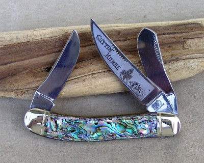 Cuttin' Horse 1 of 3 Prototype Genuine Heart Abalone engraved on the back. It is documented in the 4th generation made of 1st generation parts and abalone shell handles from the 4th generation.