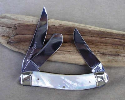THE OTHER SIDE --This is one of Jim Parkers first prototypes with script writing. I have about 15 knives that are his first prototypes - They have PRINT prototype engraved on the back of the master blade.