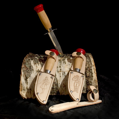 Norwegian scout knife, the model still made by Helle. One for boy scouts and one for girl scouts.