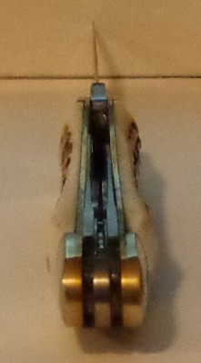 China Schrade has a fairly straight blade
