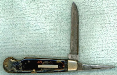 This poor nkife has been badly abused. I decided to retire him. Notice that the tang stamp is ULSTER/NKIFE CO/N.Y.