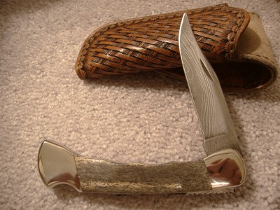 Buck 110 Damascus Mammoth Bone #1.jpg