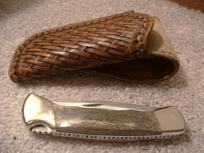 Buck 110 Damascus Mammoth Bone #3.jpg