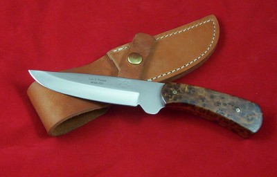 A Camillus Western with Thuya Burl handles &amp; mosaic pins.