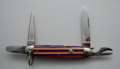 Schrade Cut Co. Walden New York, Red, White &amp; Blue Celluloid Covers, 3 3/8” closed<br />Beautifully cleaned but not overdone, lined nickel silver bolsters, one piece can opener, full awl<br />Star shield and showy covers!