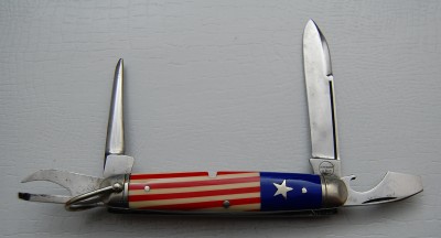 Remington UMC Circle #4235, Red, White &amp; Blue Celluloid Covers, 3 3/8” closed<br />Long pull spear blade is 99.9% full, short screwdriver, pinched and lined nickel silver bolsters<br />Inlaid star shield and some of the best bluing I ever seen on an awl!