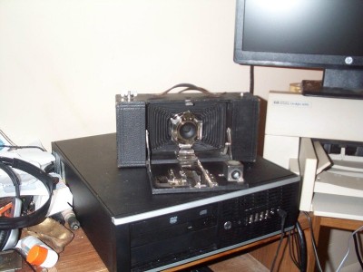 Removed from case and front opened.