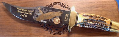 SCHRADE NRABOWIE PASSING THE TORCH.jpg