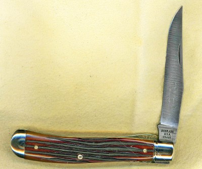 This lighter scan shows the depth of the jigging better.<br />The scratches are on my scanner, not the knife.