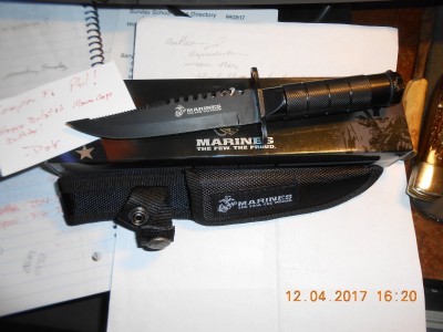 Here's the neat little fixed blade that helps celebrate the USMC.