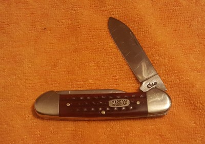 canoe case pocket worn.jpg