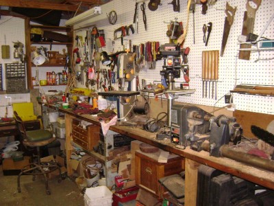 starting on the right. wood lathe, drill press, bandsaw and work bench. I love being able to make stuff and fix stuff.
