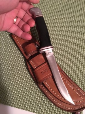 Buck 118 one-line with Buck Custom Sheath.jpg