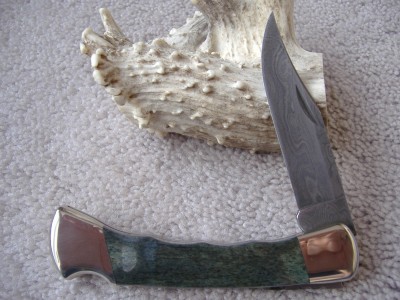 Buck 110 Damascus Camel Bone #4.jpg