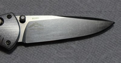 Benchmade M390 steel cuts forever and sharpens well.JPG