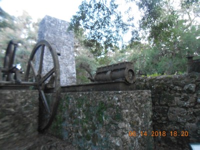 The engine above the boiler and the mill.